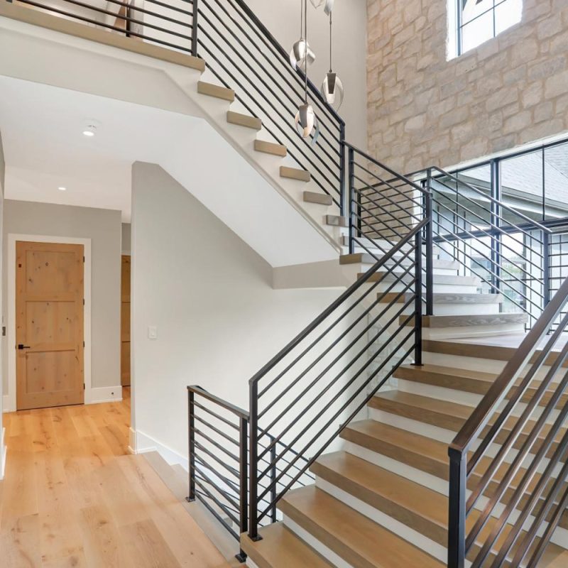 GG Custom Home staircase design | Wood Wind Landing