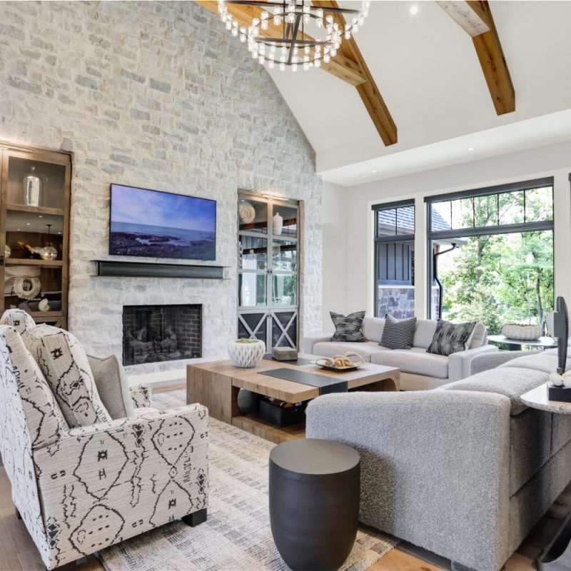 Custom home open-concept living space | Wood Wind Landing